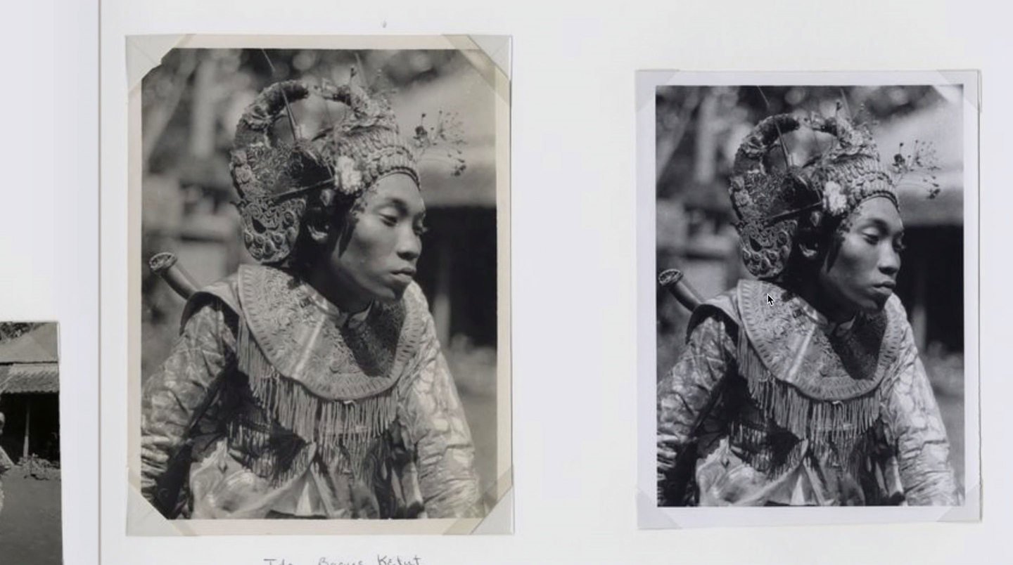 Two black and white photographs mounted side by side in an album. Both prints are the same photograph, though one is slightly bigger and yellowed. The photograph is a half-length portrait of a person in traditional Balinese garb: a large fringed collar and a headdress decorated with flowers, with their eyes cast down to the right.