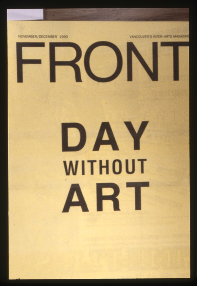 A close-up colour photograph of the cover of the “Day Without Art” issue of Front Magazine. The title, “Front,” appears in large black capital letters above “Day Without Art” on the yellow cover, with “November/December 1990” and “Vancouver’s Inter-Arts Magazine” in small letters across the top of the cover.
